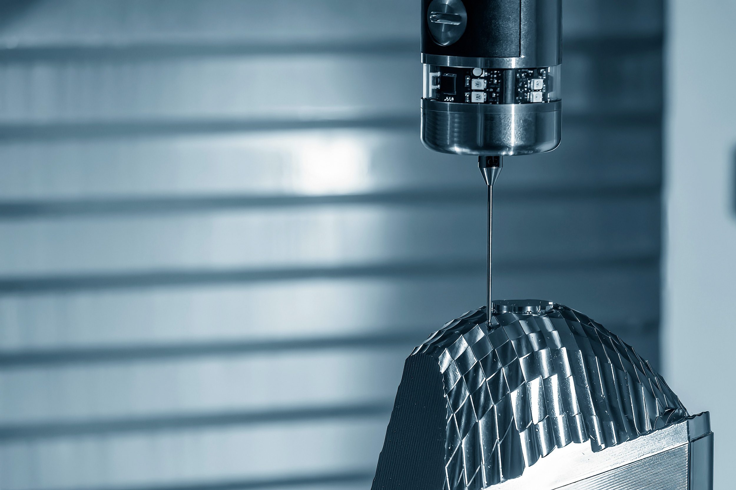 Mill inspecting precision parts